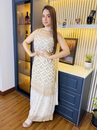 White sleveless kurti set with fancy dupatta